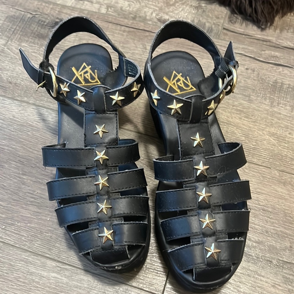 YRU sandals never worn except by previous owner